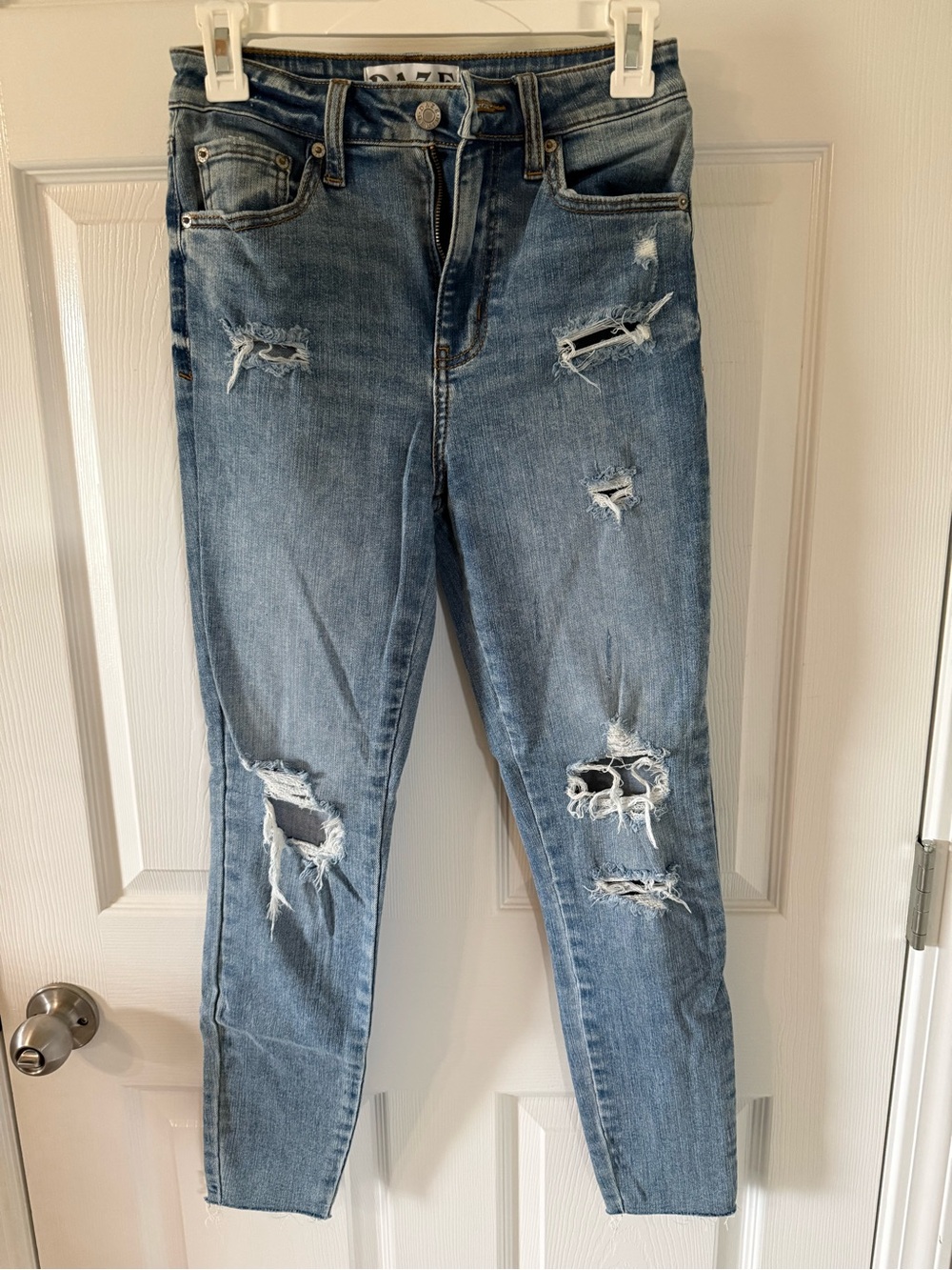 Distressed Light Blue Skinny Jeans - High-Rise Slim Fit